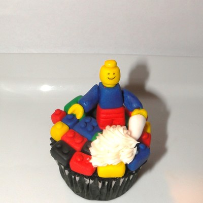 Lego Man Decorates A Cupcake