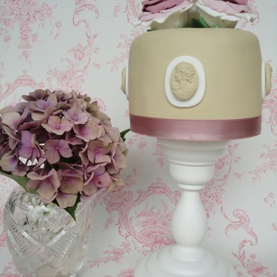 Beige Mini-Cake With Deep Purple Roses