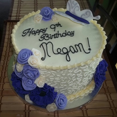 Buttercream Birthday Cake With Purple Flowers