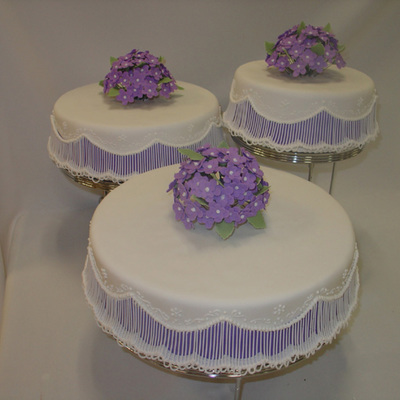 Staggered Wedding Cake With Purple Underlay & Stringwork