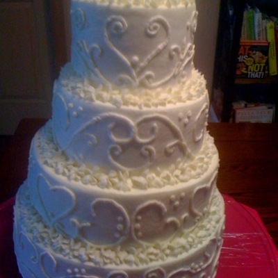 Scrolls And Hearts Wedding Cake