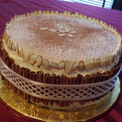 Spice Cake With Caramel Icing And Cinnamon Sticks