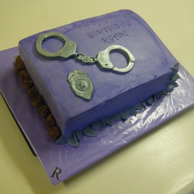 Purple Police Handcuff Birthday Cake