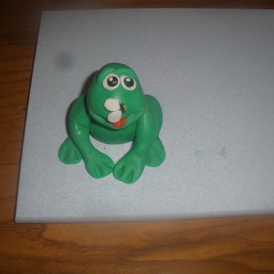 Frog With Bumbell Bee On Nose