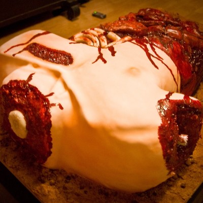 Decapitated, Armless Body With A Side Of Guts