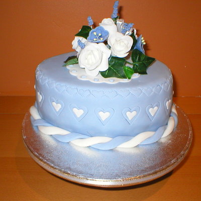 Blue Gumpaste Flowers Oval Cake