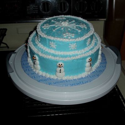 Side View Of Round Snowman/snowflake Cake