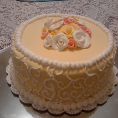 Fondant Yellow Cake With Pink, White, And Yellow Roses