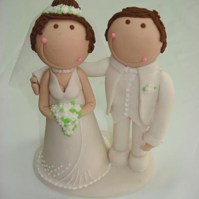 Bride And Groom Dressed In White