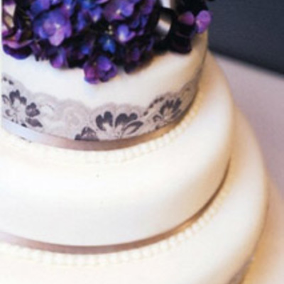 Three Tier Wedding Cake With Fresh Hydrangeas And Lace