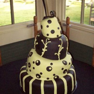Black And Green Topsy Turvy Wedding Cake