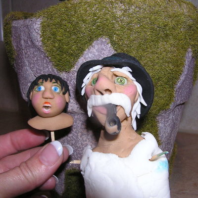 Old Man Carving And Grandson