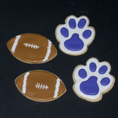 Footballs And Bobcat Paws