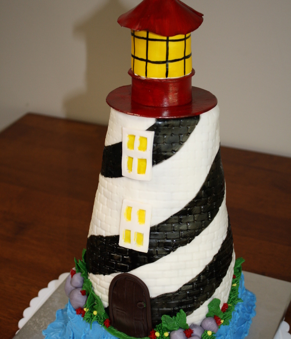 Lighthouse In The Bay