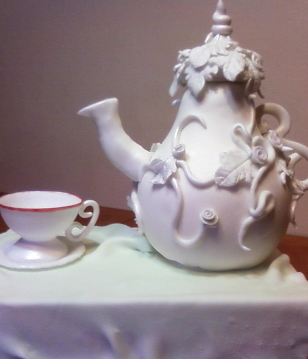 Tea Pot With Tea Cup