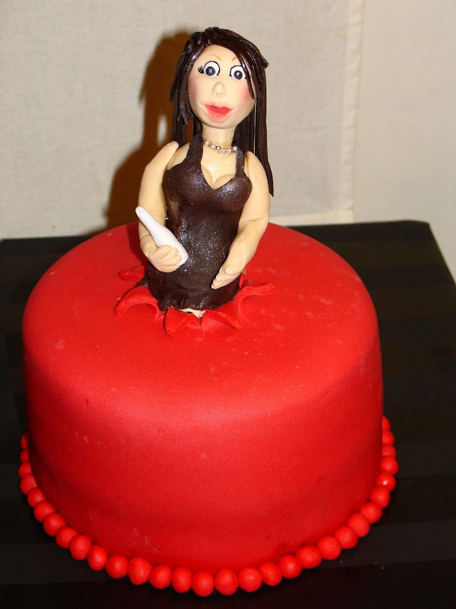 Woman Jumping Out Of The Cake