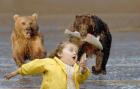 Image result for kid running away from bear with fish