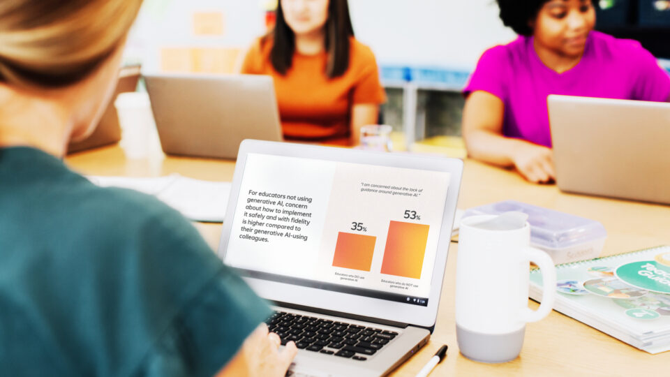 Student with laptop showing data chart