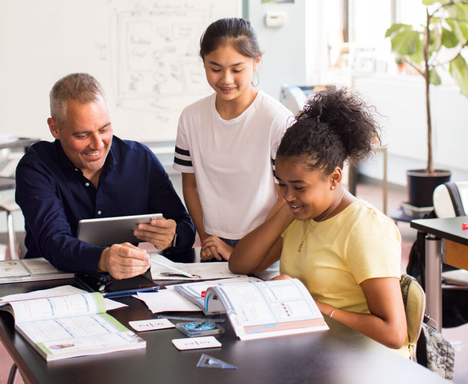 Teacher with students