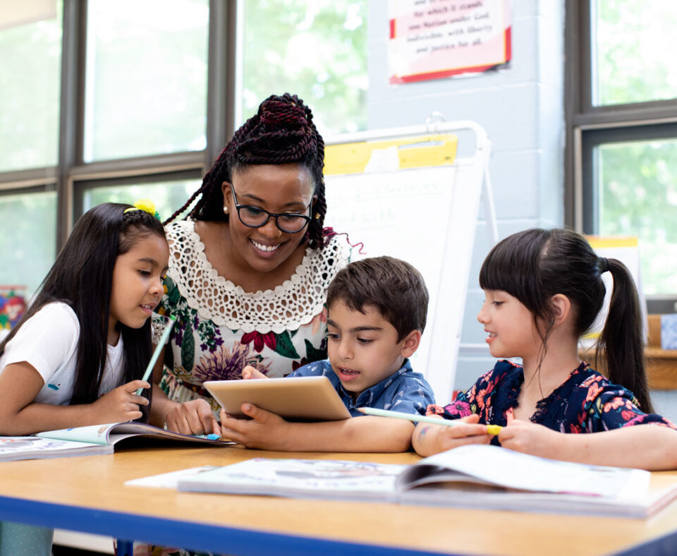 Teacher with students