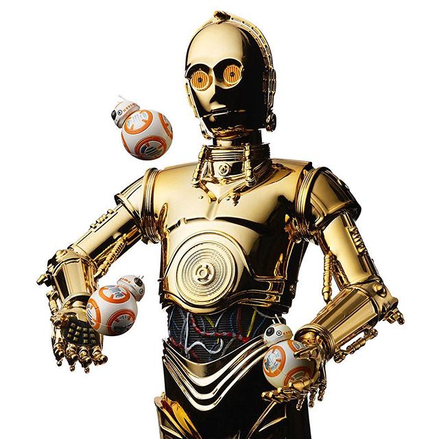 A gold C-3PO droid interacts with several BB-8 droids, a fun Star Wars scene for fans and marketing.