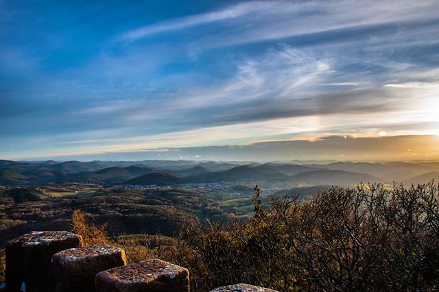 Scenic mountain landscape view with a beautiful sky and distant hills at sunset. Perfect for travel and nature themes.