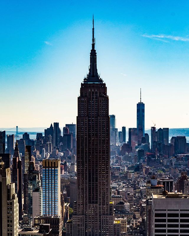 Scenic view of the Empire State Building and the New York City skyline on a clear day.
