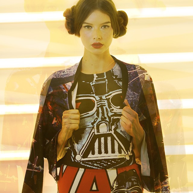 A stylish woman in Star Wars-themed fashion, showcasing a modern and confident look for editorial use.