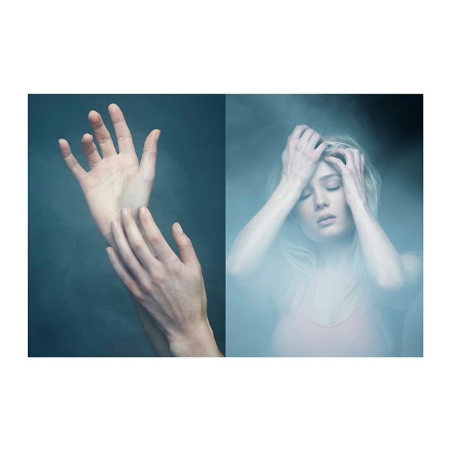 A woman with her hands in her hair evokes a dreamy, emotional mood in an editorial style image.
