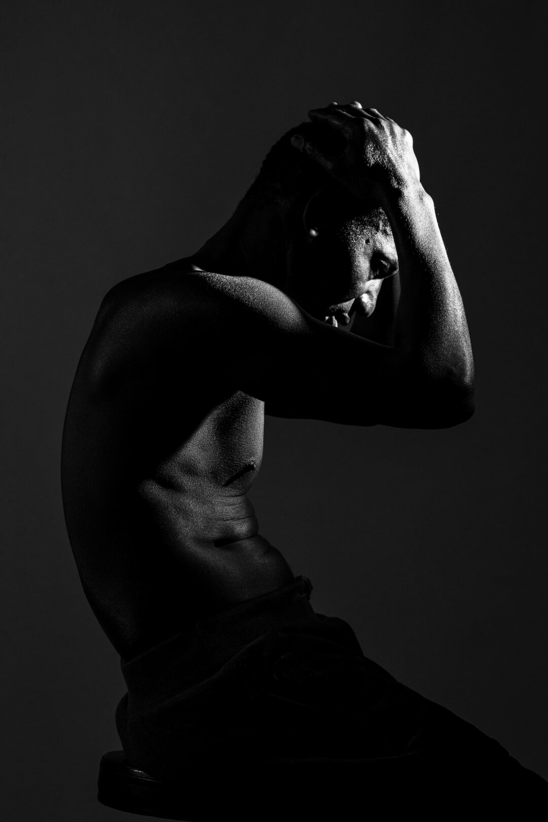 Shirtless Man Dramatic Lighting Black And White Portrait