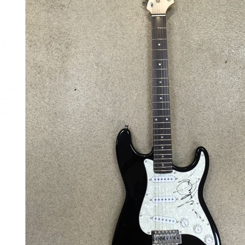 Guitar signed by the King of Pop, Michael Jackson