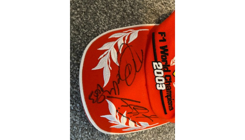 Cappellino Ferrari 2003 - autografato da Barrichello e Schumacher -  CharityStars