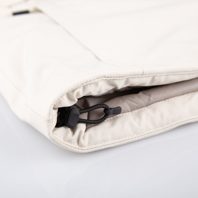 Ajustement au bas du manteau