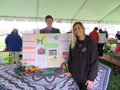 Environmental communication students show off their materials for the SEAS