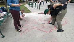 Students take part in the Red Sand Project outside of the Fenwick Library