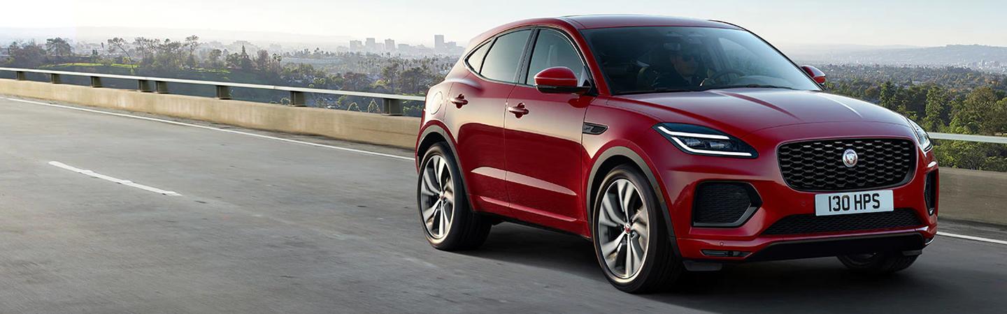 2022 Jaguar E-PACE front passenger side view driving near city