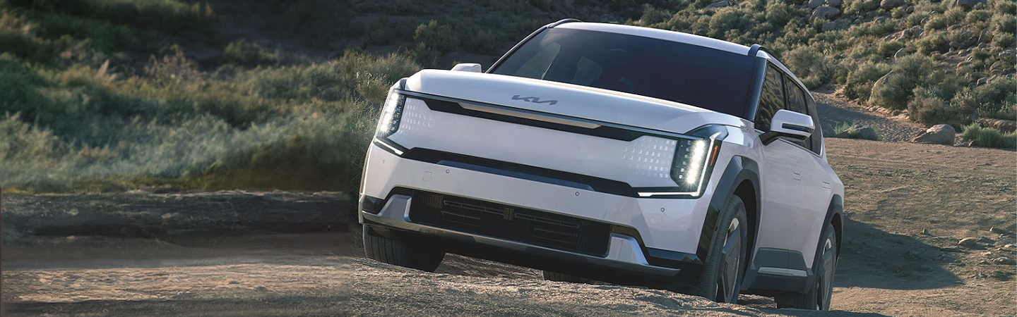 2024 Kia Niro EV vs Kia EV9 white color front view