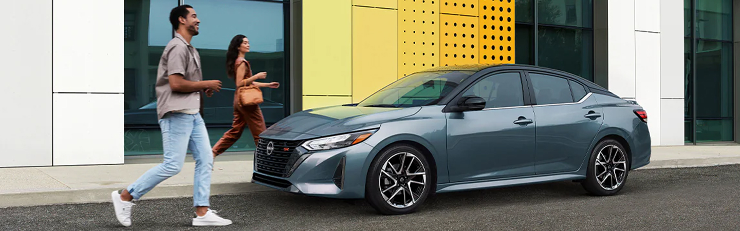 2024 Nissan Sentra vs Nissan Leaf front side in green