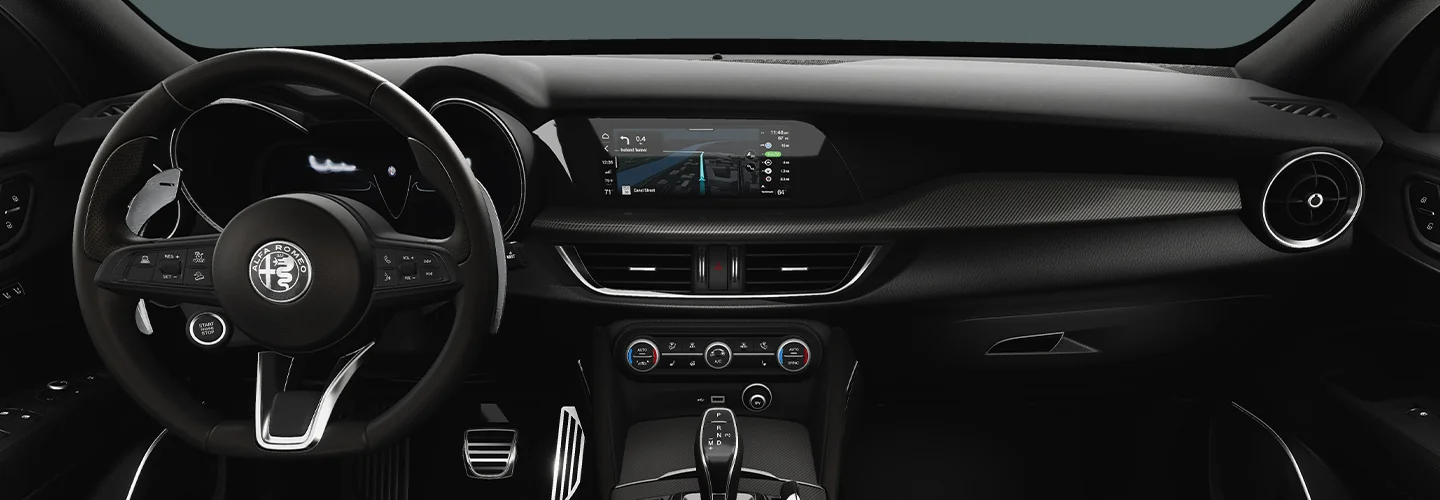 Interior view of the dashboard and tech of a 2025 Alfa Romeo Stelvio