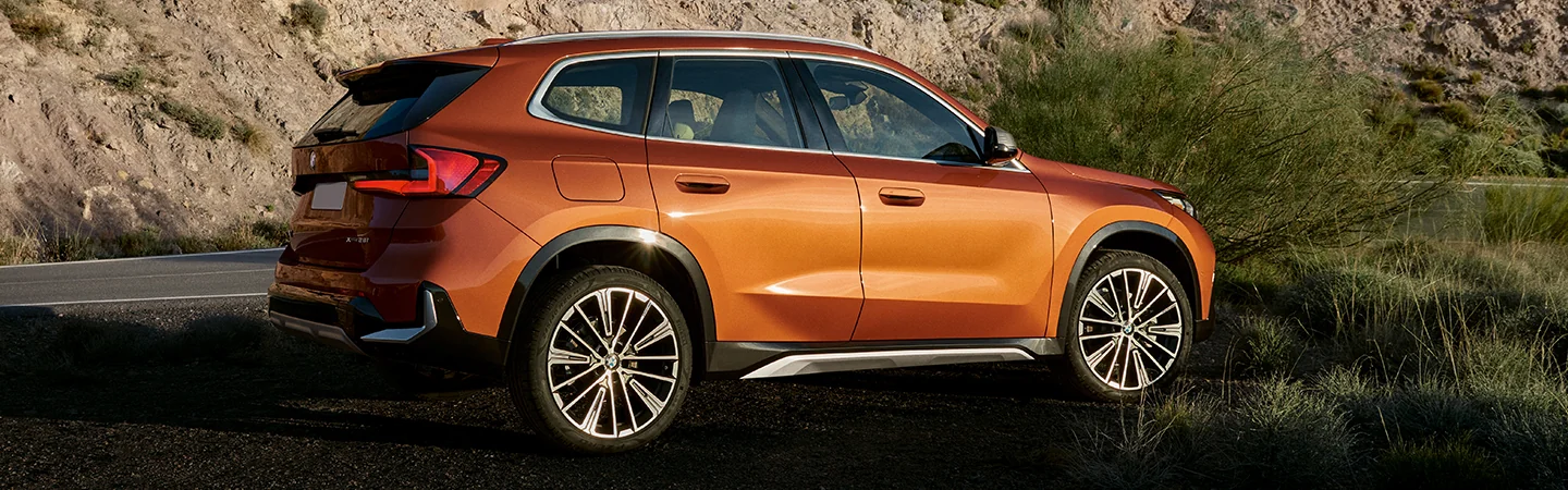 2025 BMW X1 Specs Orange Color Side View