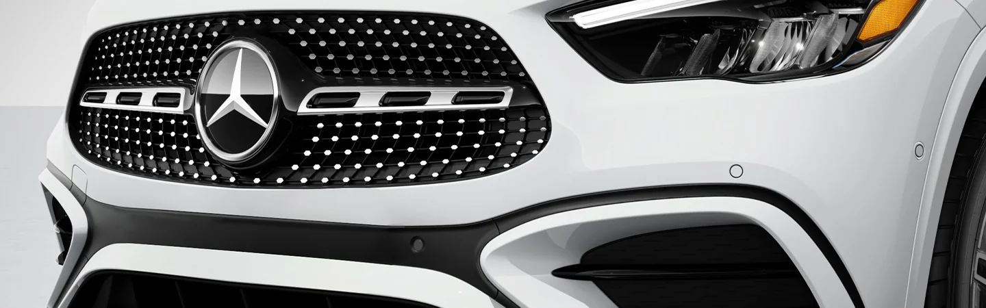 2025 Mercedes-Benz CLA 250 white car grille with emblem view