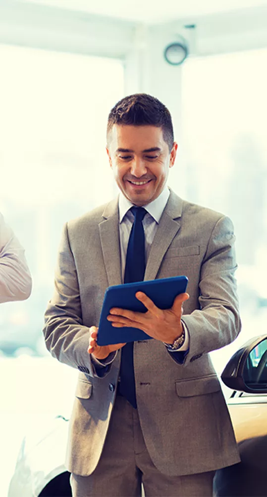 Salesman looking at a tablet