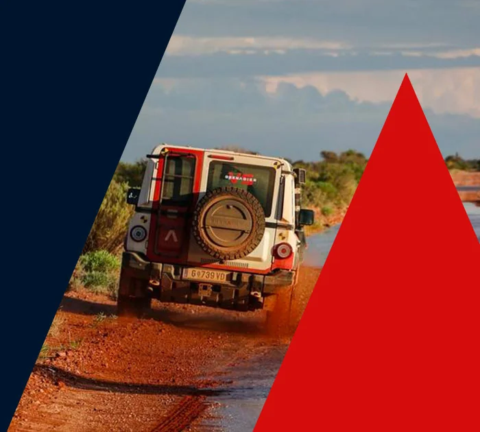 INEOS driving through mud