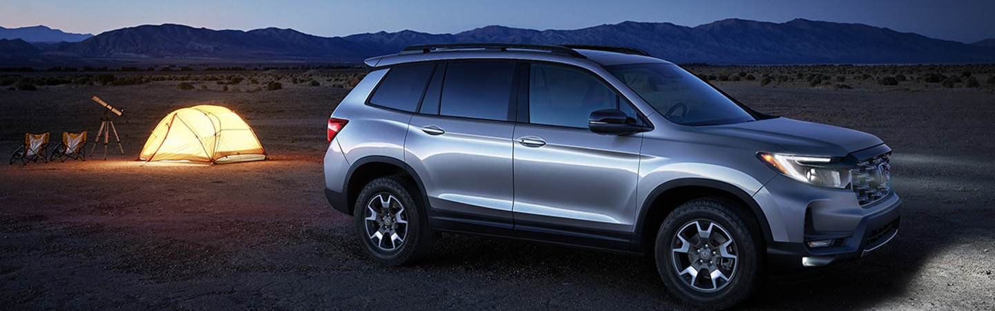 2024 Honda Passport Specs side front in silver