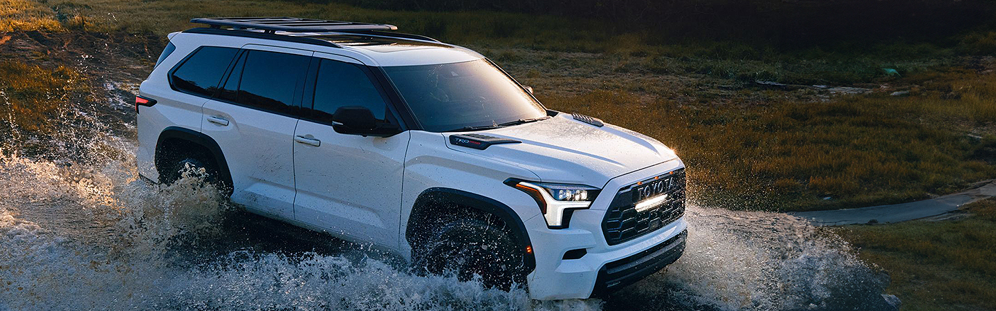 2024 Toyota Sequoia vs 2024 Toyota Highlander front side in white