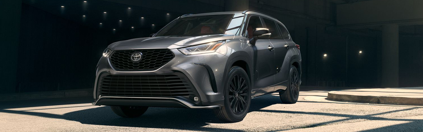 2024 Toyota Sequoia vs 2024 Toyota Highlander front side in silver