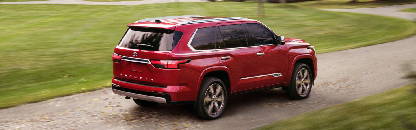 2024 Toyota Sequoia vs 2024 Toyota Highlander side back in red