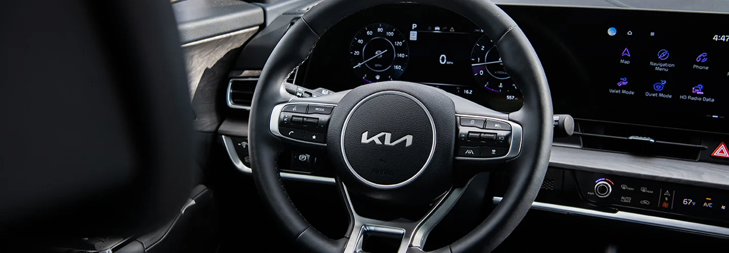 Interior view of the dash and tech of a 2025 Kia Sportage Specs
