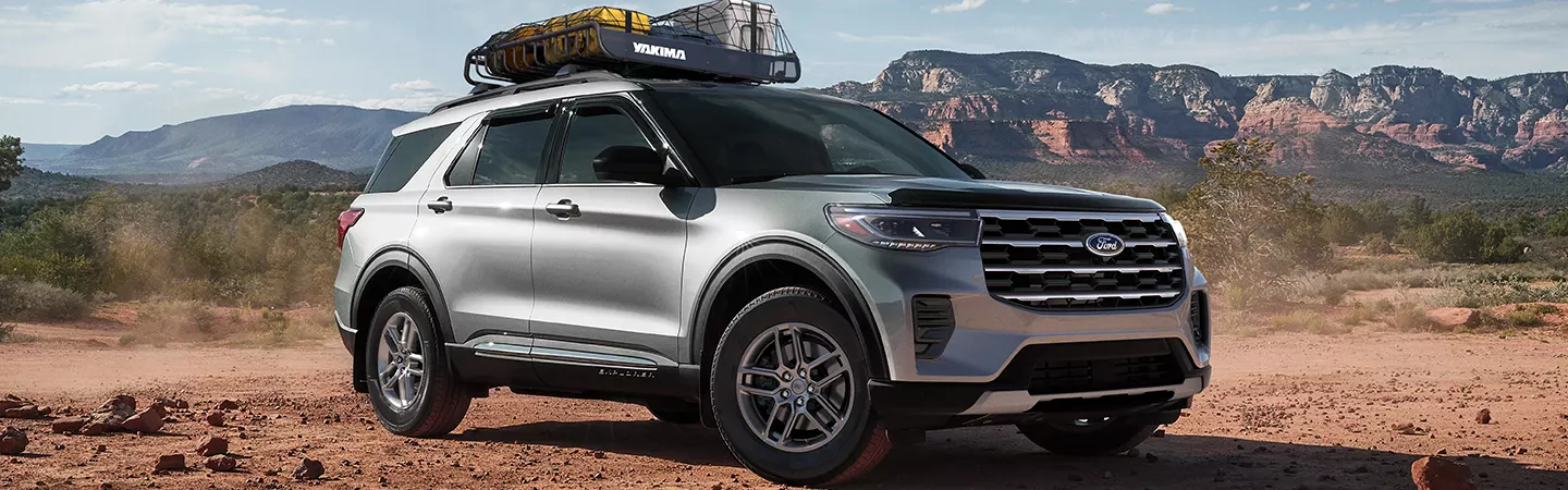 2026 Ford Explorer silver driving on dirt road