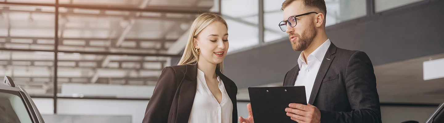Sales person talking to customer about buy a new Lamborghini
